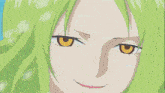 a man with green hair is smiling in front of a snowy landscape