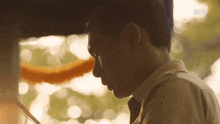 a close up of a man 's face with the word imax on the bottom right