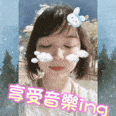 a girl with clouds on her face and the word ing in pink