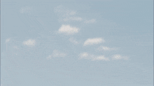 a blurred image of a person flying through the air .