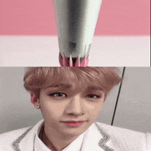 a close up of a person 's face next to a drawing of a rocket