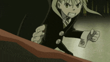 a cartoon character with a fist in the air and the letter a on his sleeve