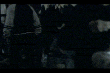 a blurred image of a person standing in a room