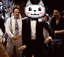a man in a tuxedo with a pixelated cat on his head