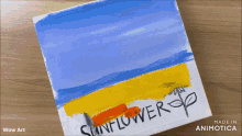 a painting of a beach with the words sunflower on it