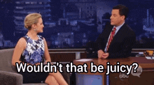 a man and a woman are sitting at a table with the words " wouldn 't that be juicy " written on it