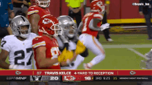 a football game between the raiders and the chiefs is being shown on espn
