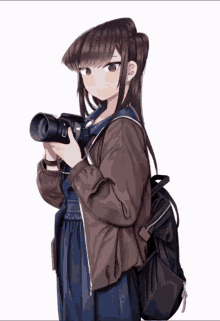 Cute Girl Holding Camera GIF - Cute Girl Holding Camera Winter Uniform GIFs