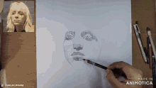 a drawing of a woman 's face is made in animotoca