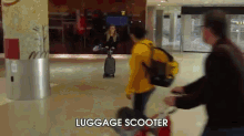 luggage luggage scooter airport riding riding in style