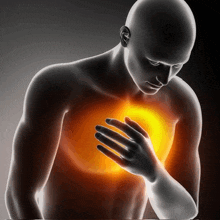 a man with his hand on his chest has a red heart