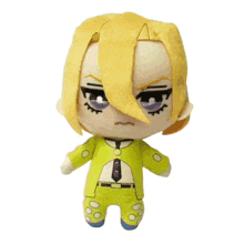 a stuffed toy with yellow hair and purple eyes is being held by a hand