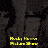 a poster for a rocky horror picture show with a woman and a man