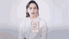 Emilia Clarke Reads Absurd Fan Theories GIF - Emilia Clarke Reading Fan Theories GIFs