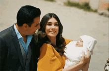 Couples Lady GIF - Couples Lady Holding A Baby GIFs