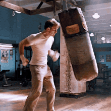 Captain America Punching GIF - Captain America Punching Training GIFs