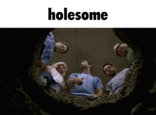 a group of people are looking into a hole and the word holesome is on the bottom