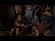 a man in a blue hat is standing next to another man