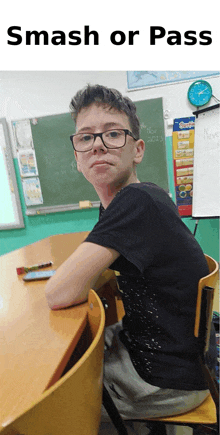 a boy wearing glasses sits at a desk with the words smash or pass written below him