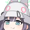a close up of a cartoon girl wearing a hat with a cat on it .