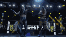 two women in a wrestling ring with a sign that says ' nxt ' in the background