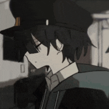 a close up of a person wearing a black hat