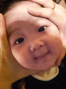 Little Dumpling GIF - Kid Face Squeeze GIFs