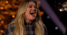 Happy Kelly Clarkson GIF - Happy Kelly Clarkson Rockefeller Christmas GIFs