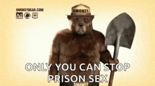 smokey the bear is holding a shovel and wearing a fireman 's hat .