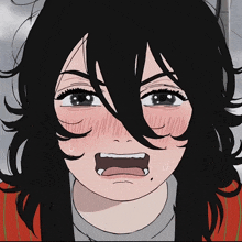 a close up of a girl 's face with black hair