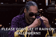 snoop dogg is wearing sunglasses and a purple shirt and says " please don t let it rain on halloween "