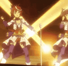 a couple of anime characters are dancing on a stage .