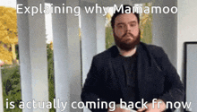 a man with a beard is explaining why mamamoo is actually coming back from now