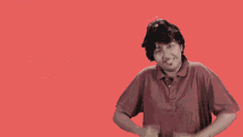 a person is giving a thumbs up in front of the letter a