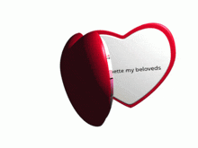 a heart shaped mirror says dekuchette my beloveds on the inside