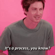 a man in a grey t-shirt says it 's a process , you know ?