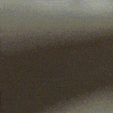 a close up of a piece of fabric with a texture of dots .
