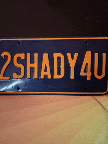 a blue license plate that says 2 shady 4u
