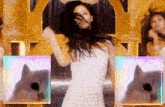 a woman in a white dress is dancing in front of a gold background with a dog in the foreground .