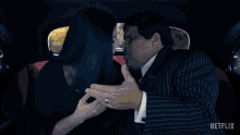 Kissing Morticia Addams GIF - Kissing Morticia Addams Gomez Addams GIFs