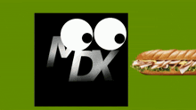 a mdx logo with a sandwich in the foreground