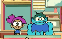 a couple of cartoon characters are standing next to each other on a counter .