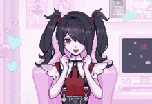 a pixel art of a girl sitting in front of a computer screen