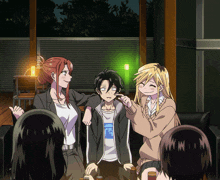 a group of anime characters are sitting around a couch with one wearing a shirt that says " i love you "