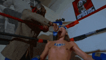 a man in a boxing ring with a shirt that says rams on it