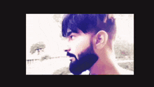 a man with a beard has the name mr written on the bottom