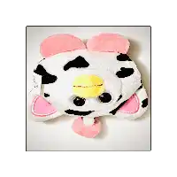 a stuffed cow with pink ears and a yellow nose