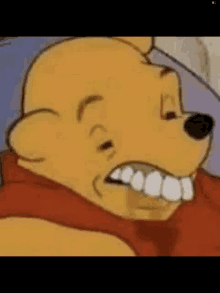 a close up of a cartoon character 's face with a big smile on it .