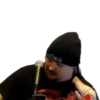 a man wearing a beanie that says tic corpse