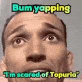 a man with a surprised look on his face says bum yapping i 'm scared of topuria